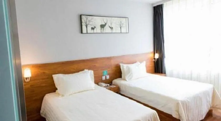 Bed in Jinjiang Inn Style Tianjin Wuqing Traditional Chinese Medical Hospital