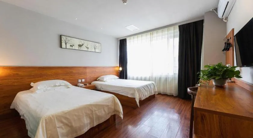 Bed in Jinjiang Inn Style Tianjin Wuqing Traditional Chinese Medical Hospital