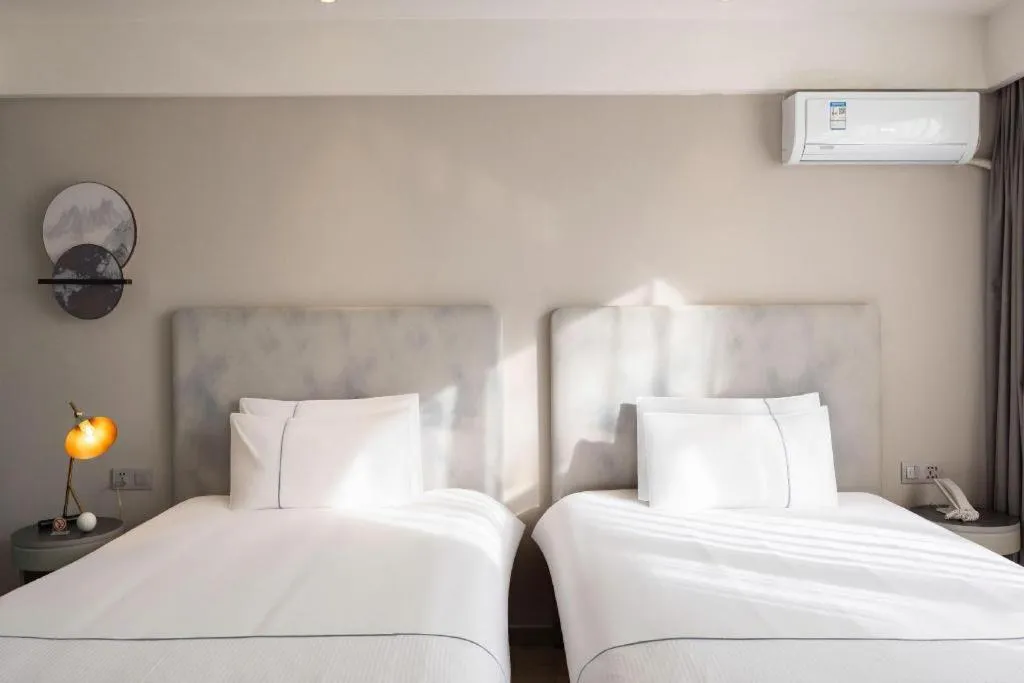 Bed in Magnotel Harbin Medical University First Affiliated Hospital