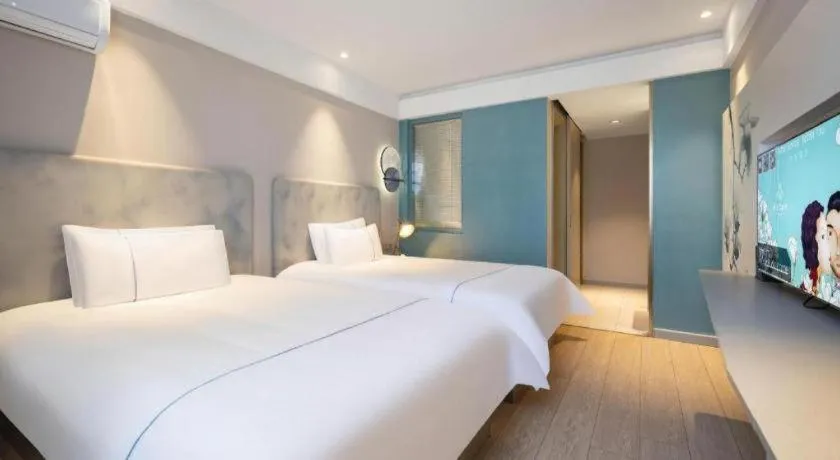 Bed in Magnotel Harbin Medical University First Affiliated Hospital