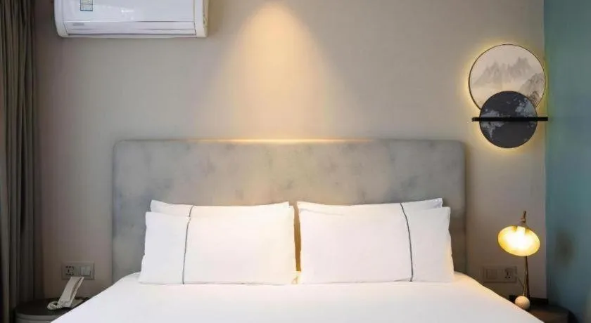 Bed in Magnotel Harbin Medical University First Affiliated Hospital