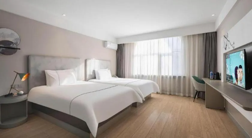 Bed in Magnotel Harbin Medical University First Affiliated Hospital