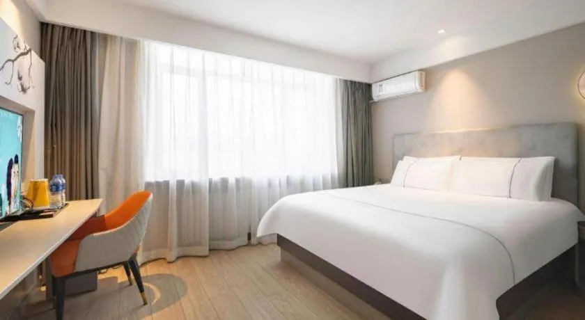 Bed in Magnotel Harbin Medical University First Affiliated Hospital