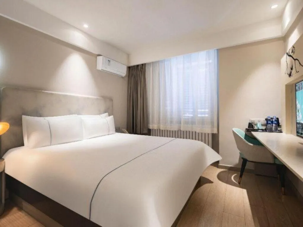 Bed in Magnotel Harbin Medical University First Affiliated Hospital