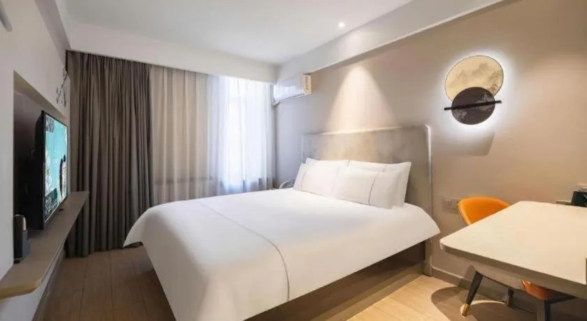 Bed in Magnotel Harbin Medical University First Affiliated Hospital