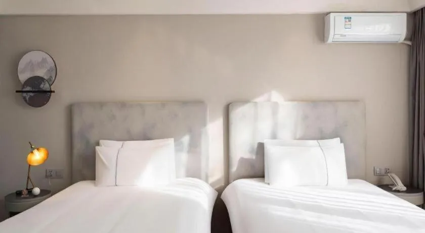 Bed in Magnotel Harbin Medical University First Affiliated Hospital