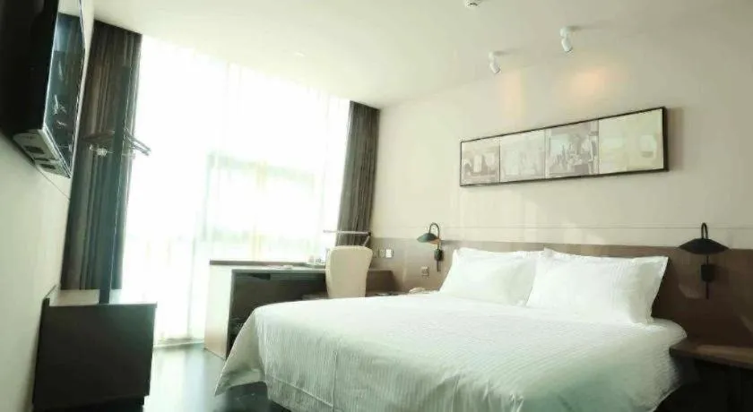 Bed in Jinjiang Inn Select Yancheng Oufeng Hua Street Julong Lake