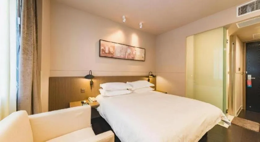 Bed in Jinjiang Inn Select Yancheng Oufeng Hua Street Julong Lake