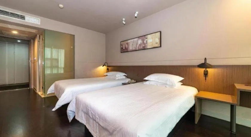Bed in Jinjiang Inn Select Yancheng Oufeng Hua Street Julong Lake