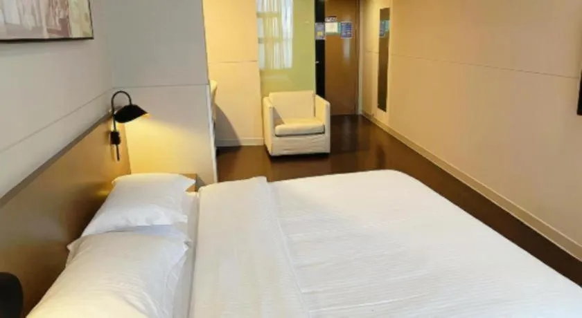 Bed in Jinjiang Inn Select Yancheng Oufeng Hua Street Julong Lake