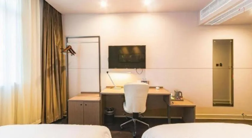 Bed in Jinjiang Inn Select Yancheng Oufeng Hua Street Julong Lake