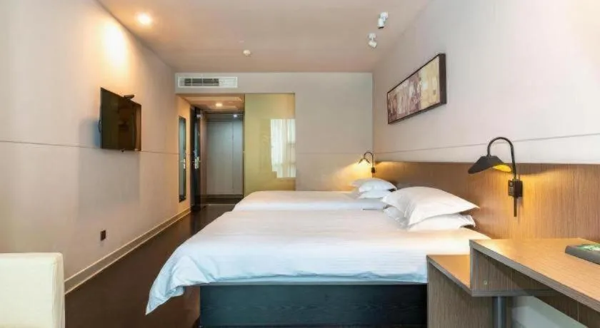 Bed in Jinjiang Inn Select Yancheng Oufeng Hua Street Julong Lake