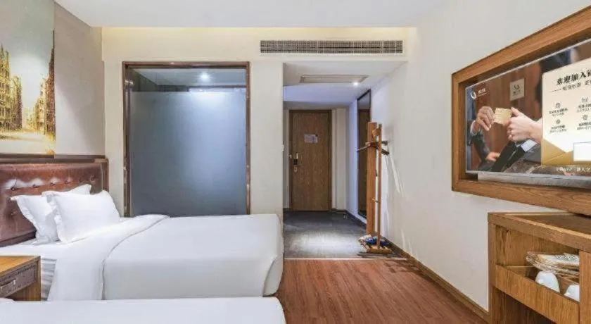 Bed in James Joyce Coffetel·Hengyang Jiefang Road Xianfeng Dock