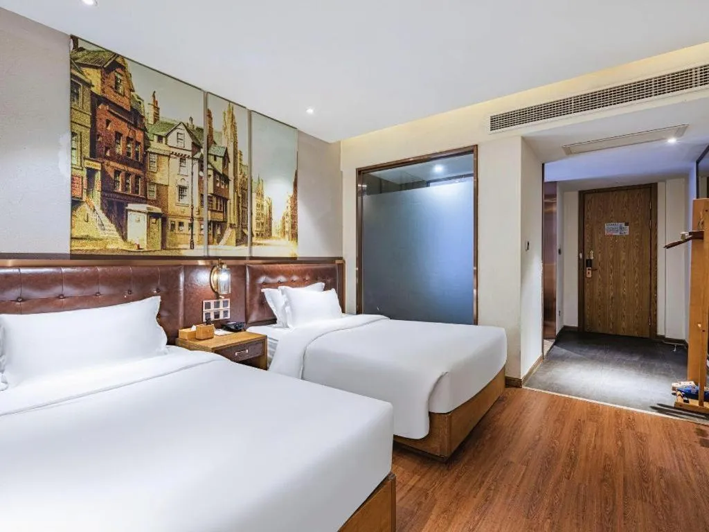 Bed in James Joyce Coffetel·Hengyang Jiefang Road Xianfeng Dock