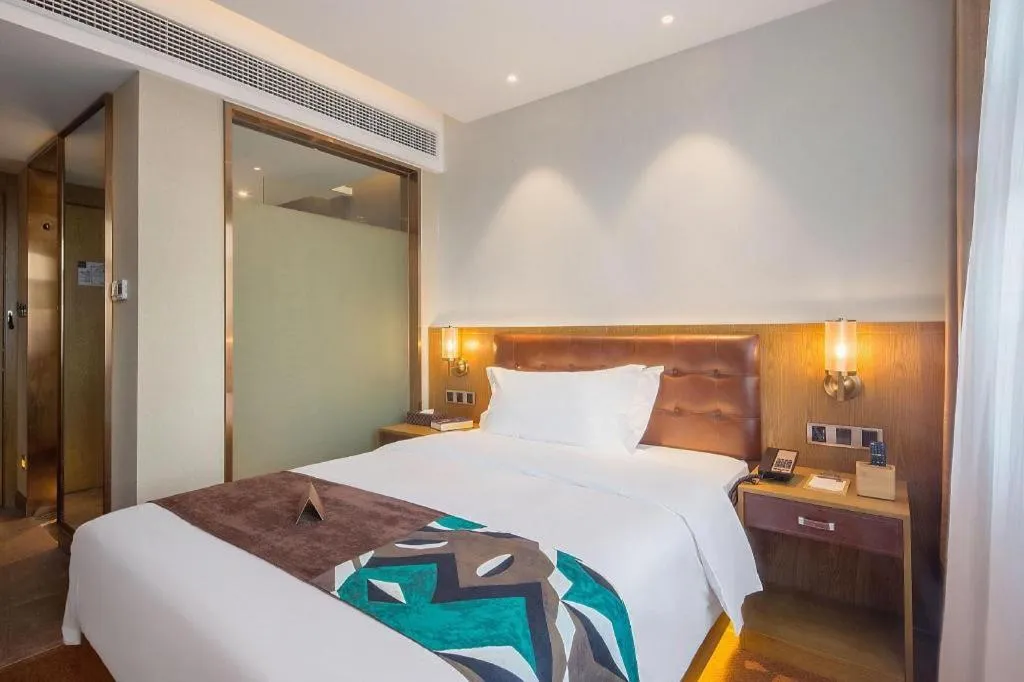 Bed in James Joyce Coffetel·Hengyang Jiefang Road Xianfeng Dock