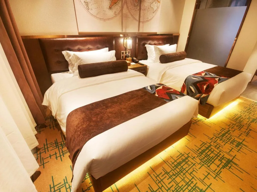 Bed in James Joyce Coffetel·Hengyang Jiefang Road Xianfeng Dock