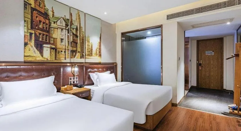Bed in James Joyce Coffetel·Hengyang Jiefang Road Xianfeng Dock