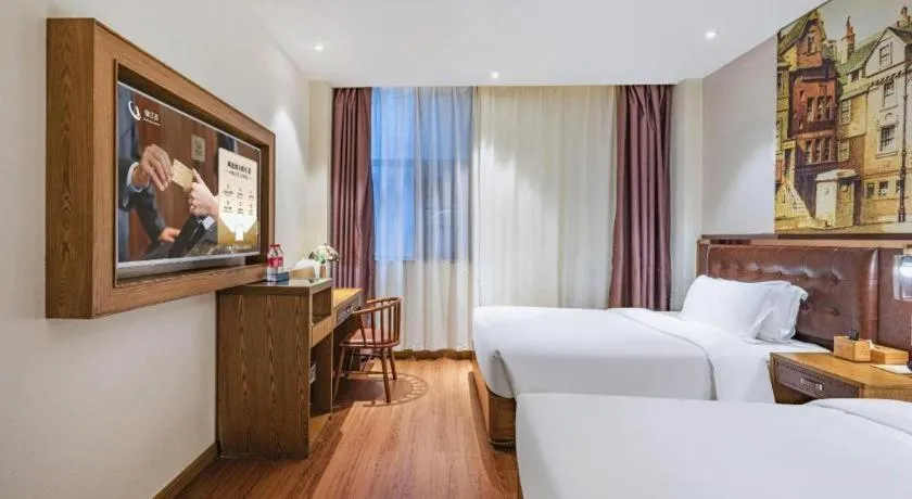 Bed in James Joyce Coffetel·Hengyang Jiefang Road Xianfeng Dock