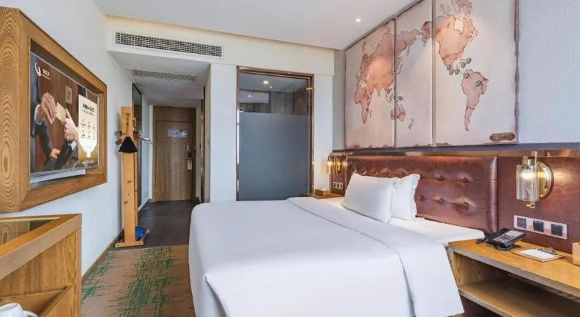 Bed in James Joyce Coffetel·Hengyang Jiefang Road Xianfeng Dock