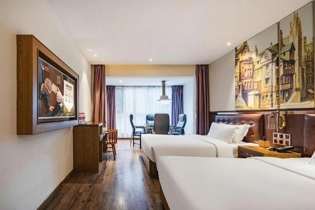 Bed in James Joyce Coffetel·Hengyang Jiefang Road Xianfeng Dock