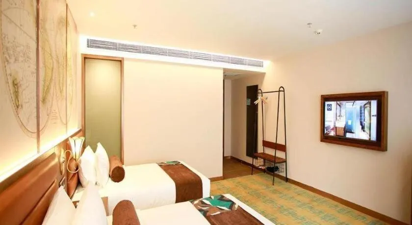 Bed in James Joyce Coffetel Harbin Railway Station Songlei Yuanda Pedestrian Street