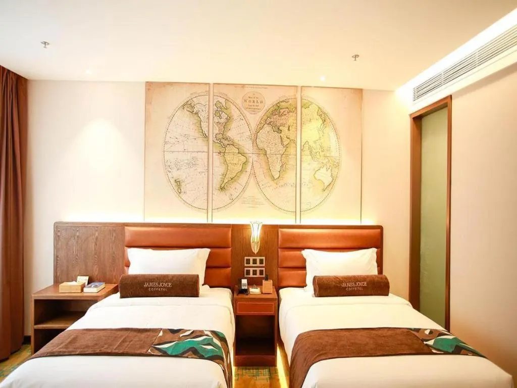 Bed in James Joyce Coffetel Harbin Railway Station Songlei Yuanda Pedestrian Street