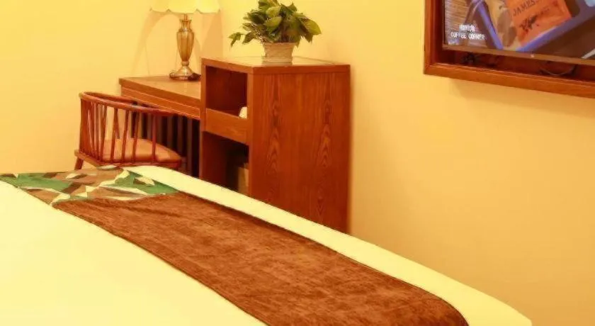 Bed in James Joyce Coffetel Harbin Railway Station Songlei Yuanda Pedestrian Street