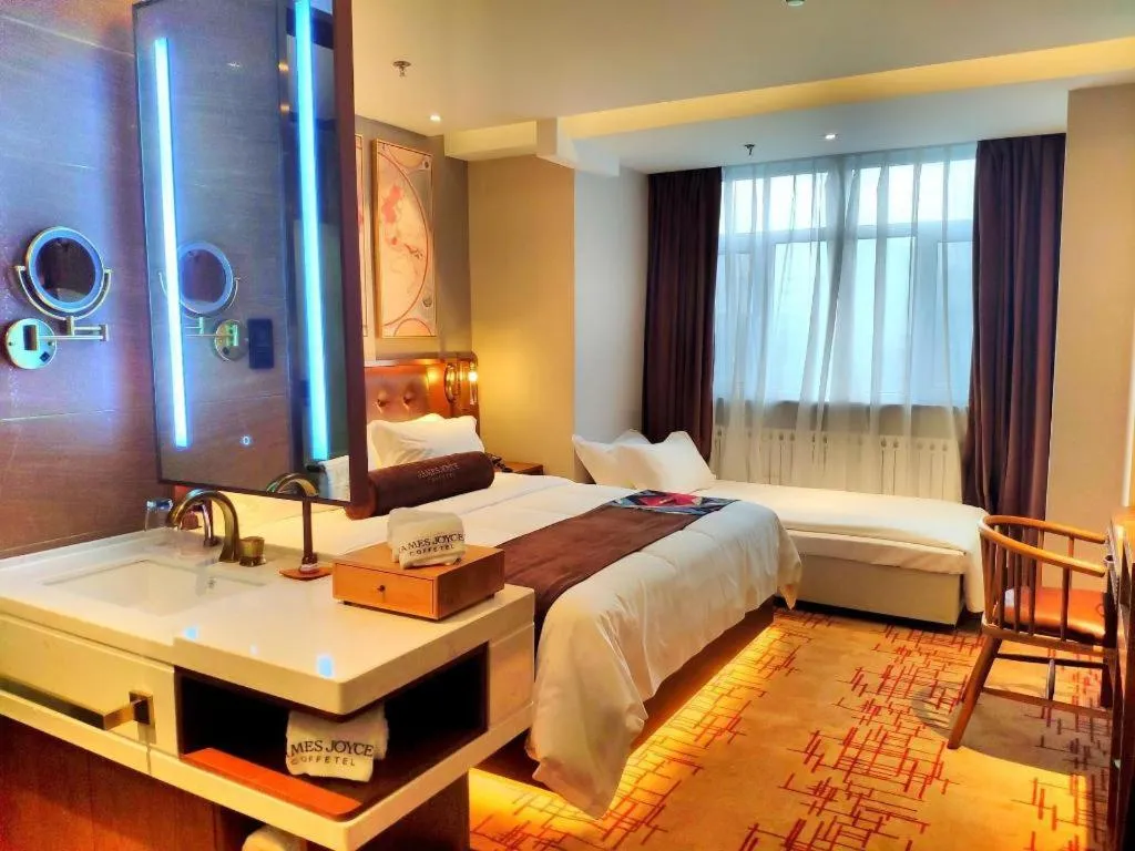 Bed in James Joyce Coffetel·Huludao Xingcheng Seaside Tourist Scenic Spot