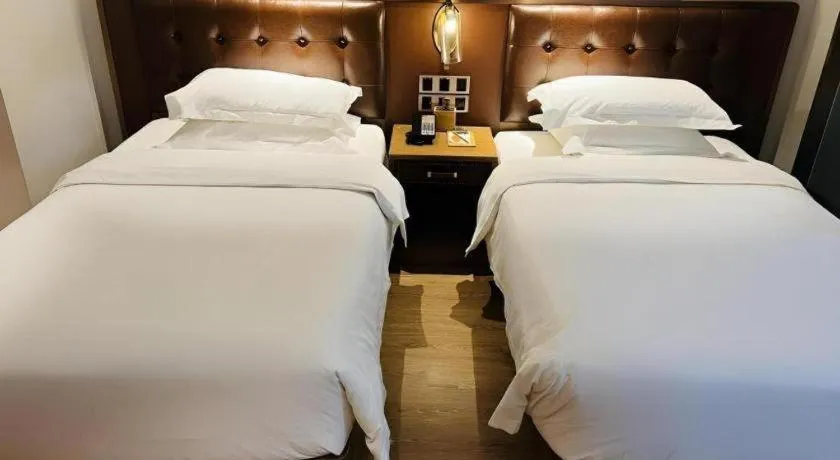 Bed in James Joyce Coffetel·Huludao Xingcheng Seaside Tourist Scenic Spot