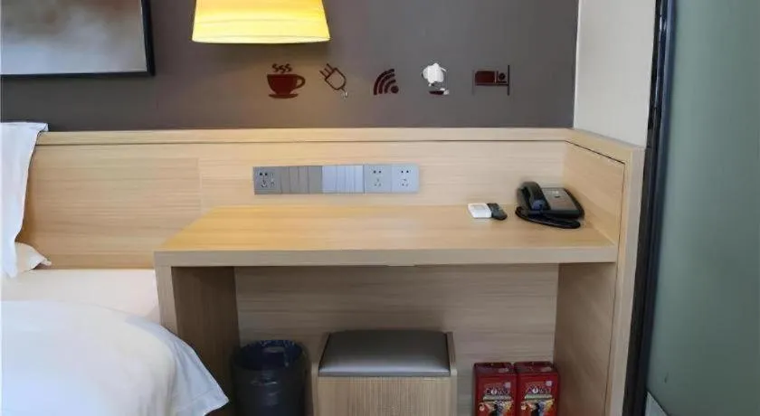 Bed in IU Hotel Nanchang West Railway Metro Station