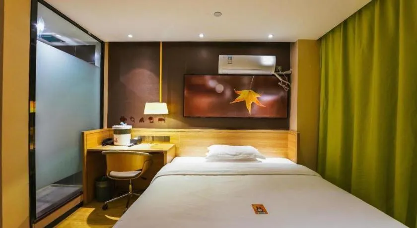 Bed in IU Hotel Nanchang West Railway Metro Station