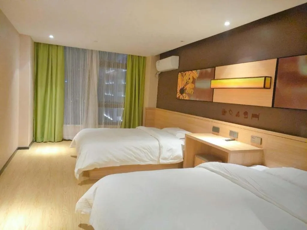 Bed in IU Hotel Nanchang West Railway Metro Station