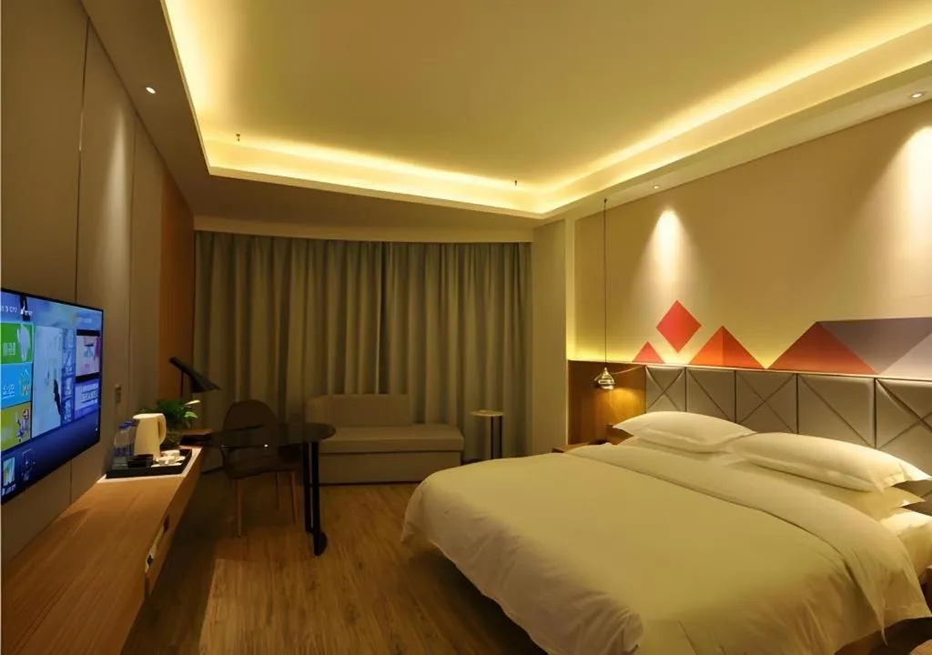 Bed in Borrman Hotel Hechi Bama Central Cultural Plaza