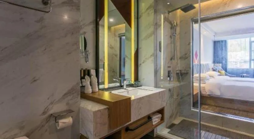 Bed in Borrman Hotel Hechi Bama Central Cultural Plaza