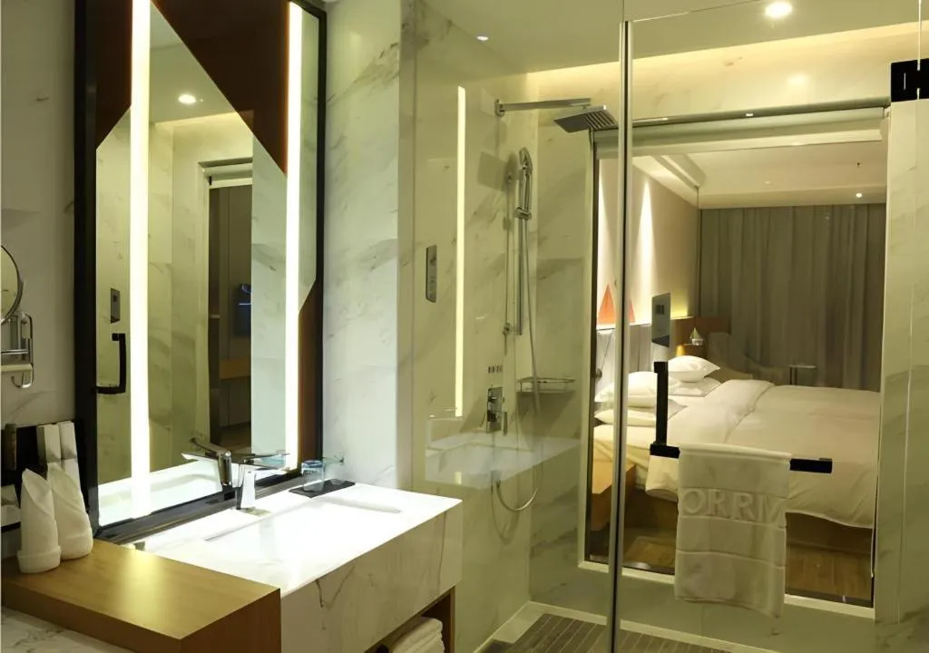 Bed in Borrman Hotel Hechi Bama Central Cultural Plaza