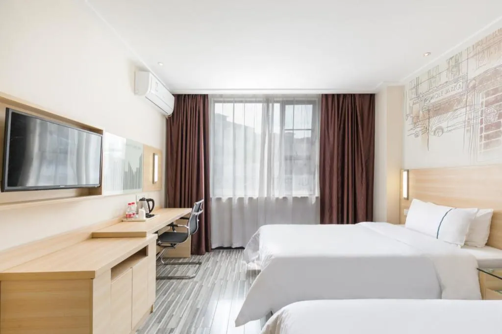 Bed in City Comfort Inn Guangzhou Zengcheng Wanda Plaza Metro Station