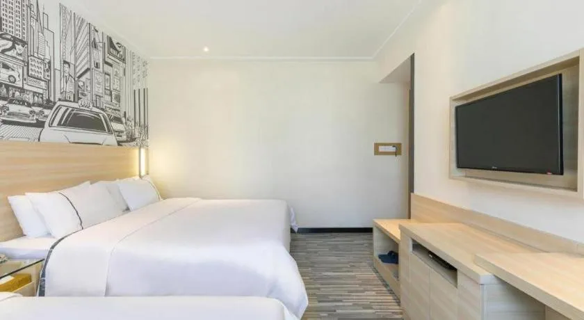 Bed in City Comfort Inn Guangzhou Zengcheng Wanda Plaza Metro Station