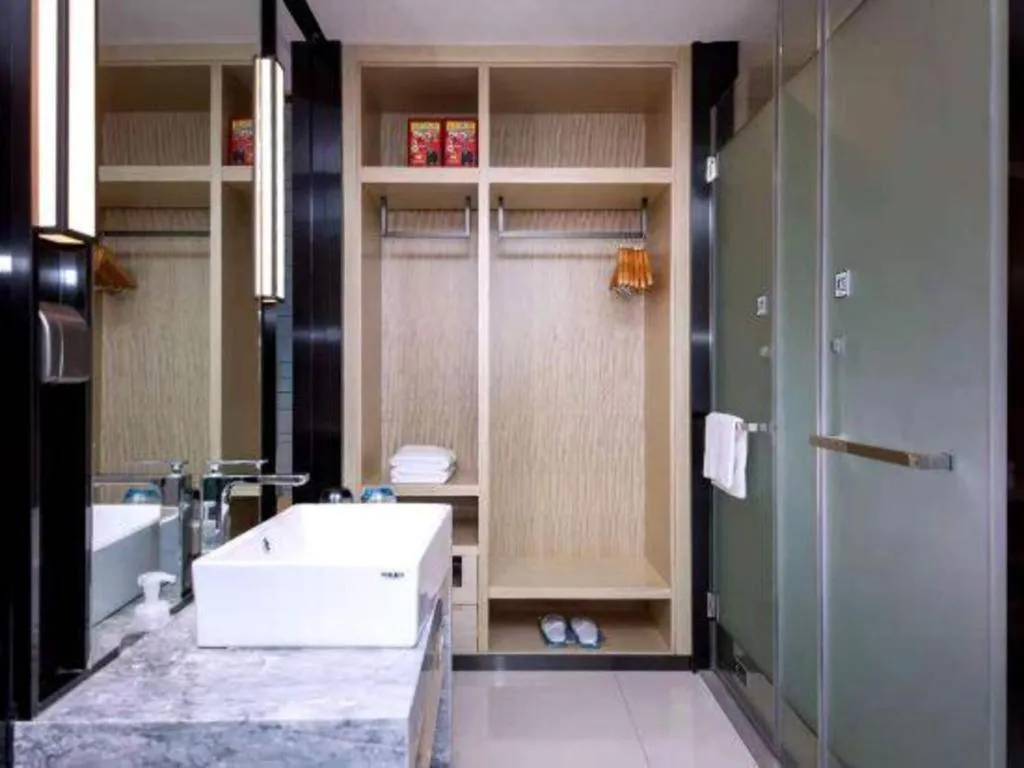 Bed in Echarm Hotel Xiantao Yuantai Weilaicheng