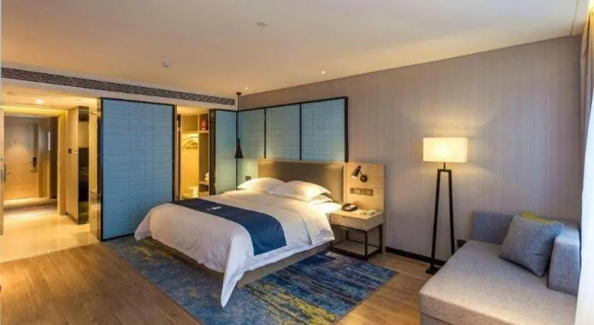 Bed in Echarm Hotel Xiantao Yuantai Weilaicheng