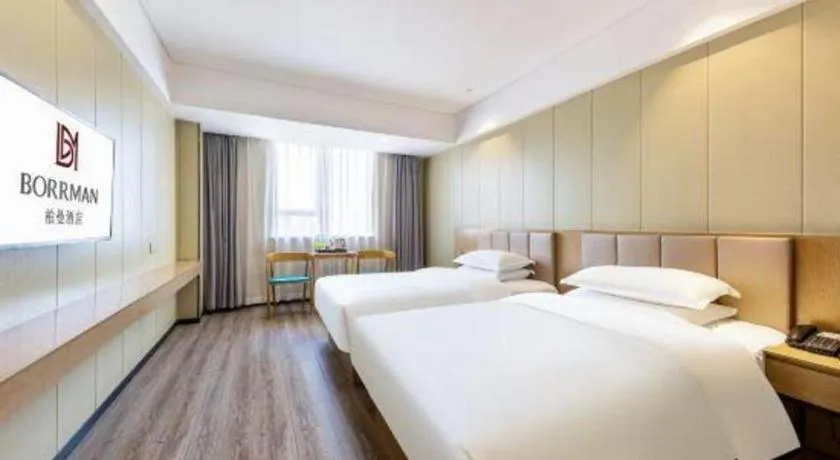 Bed in Borrman Hotel Xiamen Xiang'an Maxiang