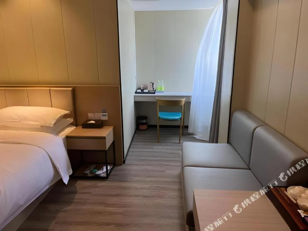 Bed in Borrman Hotel Xiamen Xiang'an Maxiang