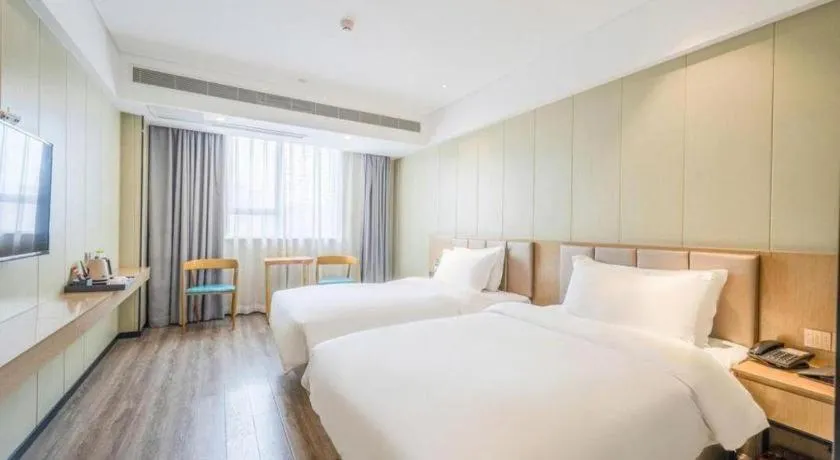 Bed in Borrman Hotel Xiamen Xiang'an Maxiang