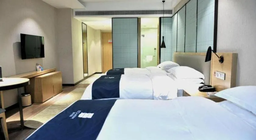 Bed in Echarm Hotel Hefei Binhu Exhibition Center