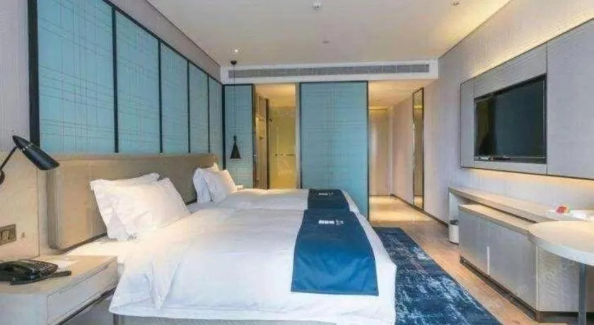 Bed in Echarm Hotel Hefei Binhu Exhibition Center
