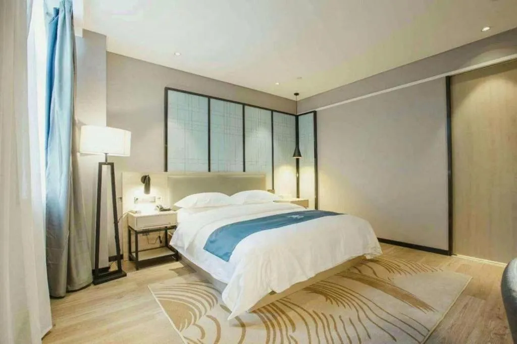 Bed in Echarm Hotel Hefei Binhu Exhibition Center