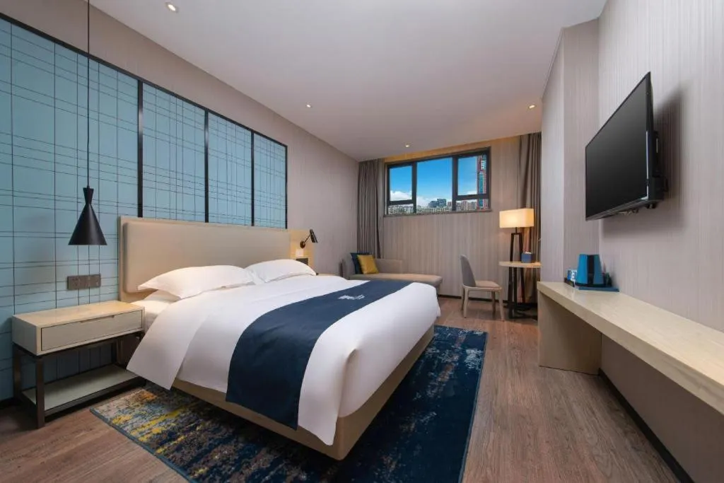 Bed in Echarm Hotel Hefei Binhu Exhibition Center