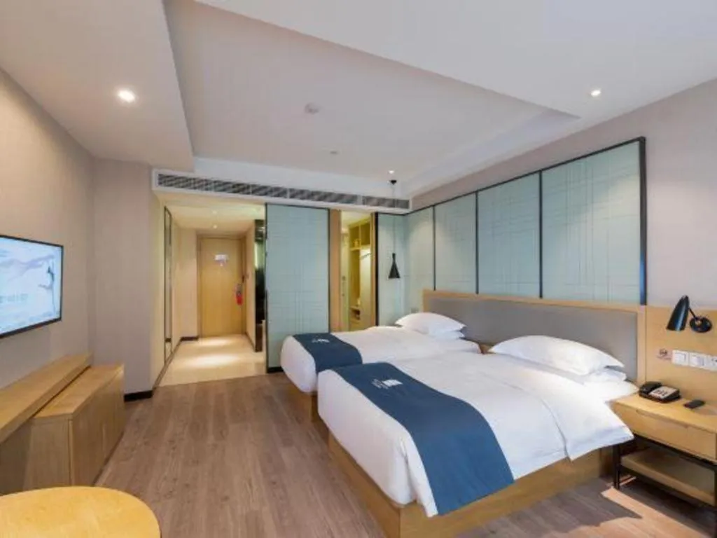 Bed in Echarm Hotel Hefei Binhu Exhibition Center