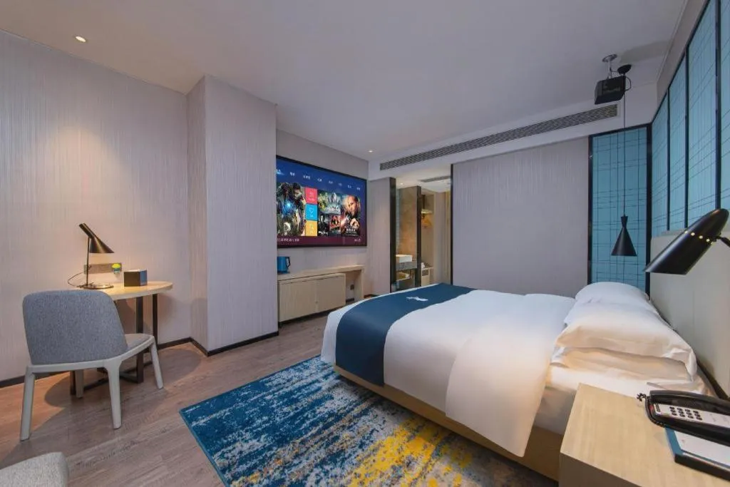 Bed in Echarm Hotel Hefei Binhu Exhibition Center