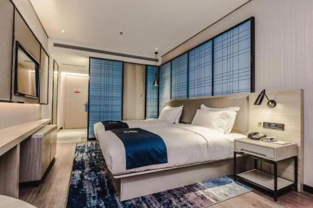 Bed in Echarm Hotel Hefei Binhu Exhibition Center