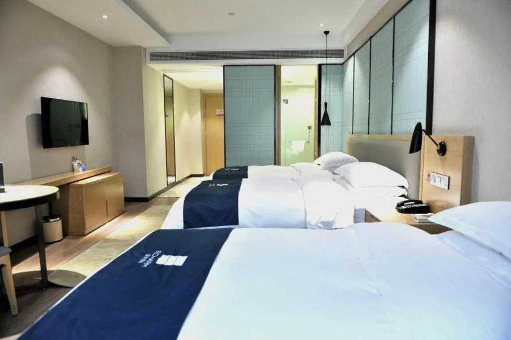 Bed in Echarm Hotel Hefei Binhu Exhibition Center